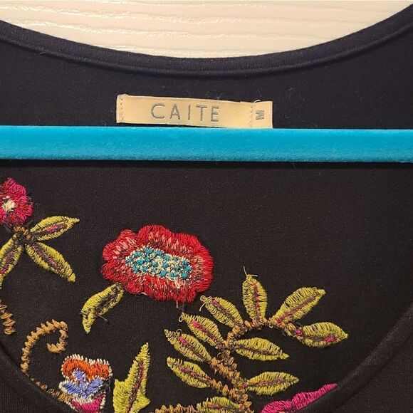 CAITE Anthropologie Black w/ Floral Embroidered Tunic Top, Ruffled Hemline | M - Picture 3 of 8